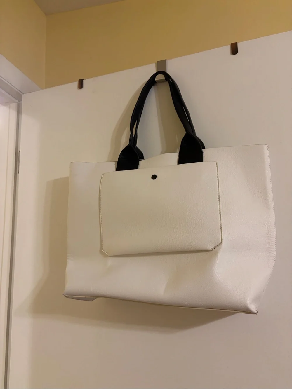 White Tote Bag with Black Handles and Bold Black Text